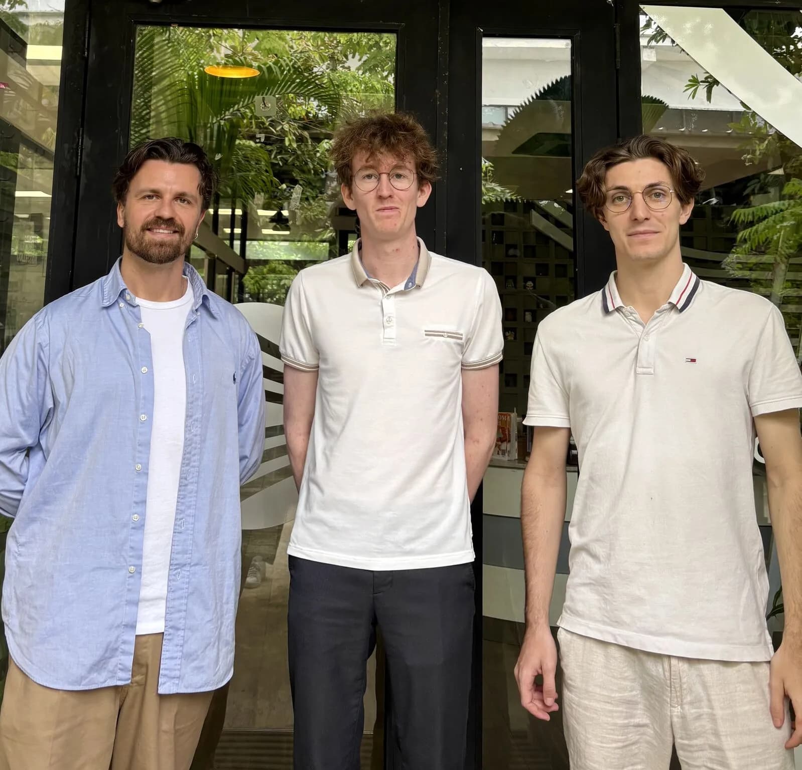 Three team members in Phnom Penh